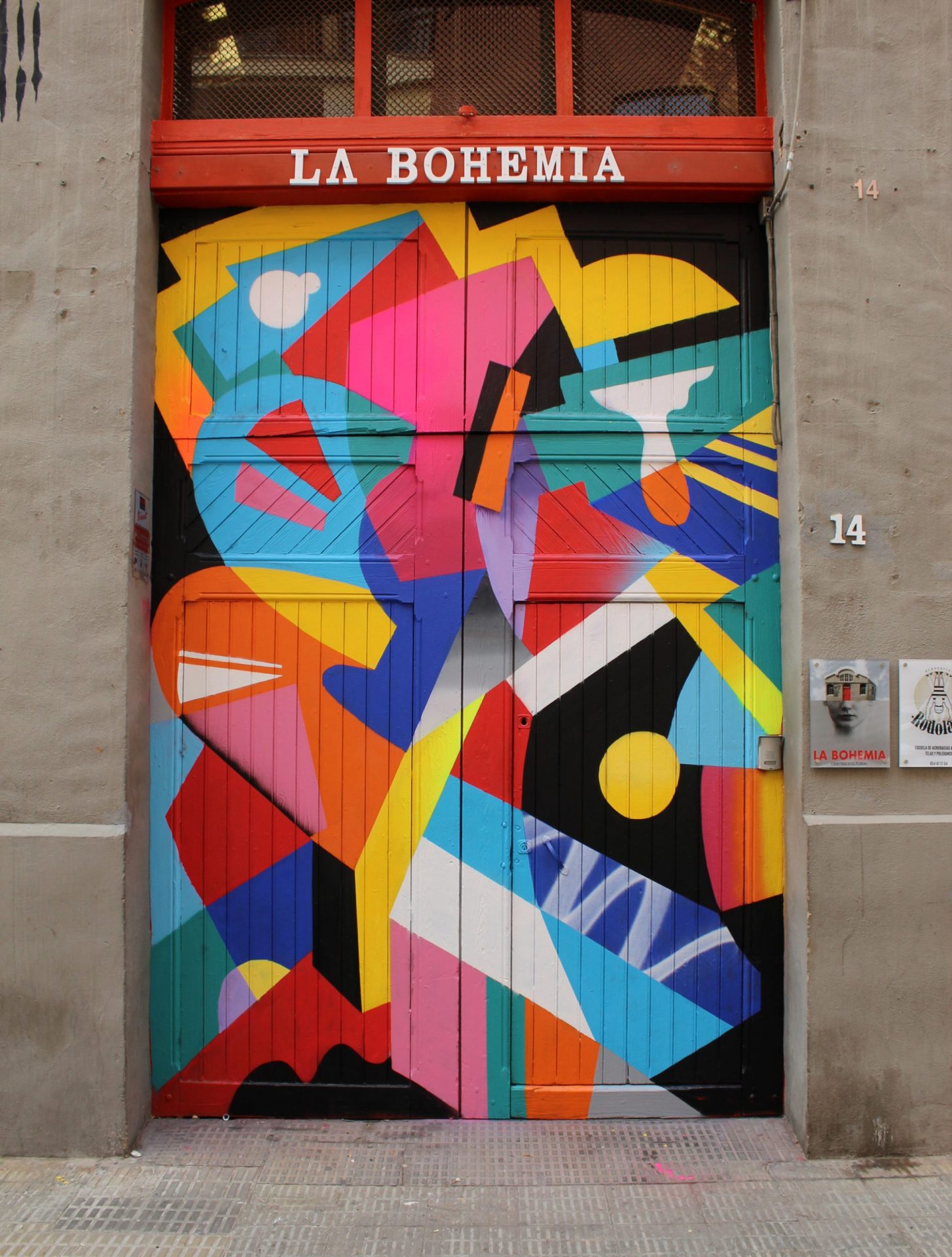 Hize abstract mural with colorful graffiti shapes in an interior space
